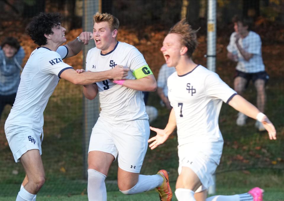 Morris Twp., NJ Ñ November 7, 2023 Ñ Roan Sullivan and Nicholas Lapczynski celebrate with Seton Hall Prep teammate Eddie Krupski, who scored the winning goal in the second half as Seton Hall Prep defeated Delbarton 2-1 in the in NJSIAA Non-Public A North soccer final in a game played at Delbarton.