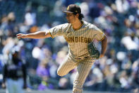 San Diego Padres starting pitcher Yu Darvish works against the Colorado Rockies in the second inning of game one of a baseball doubleheader Wednesday, May 12, 2021, in Denver. (AP Photo/David Zalubowski)