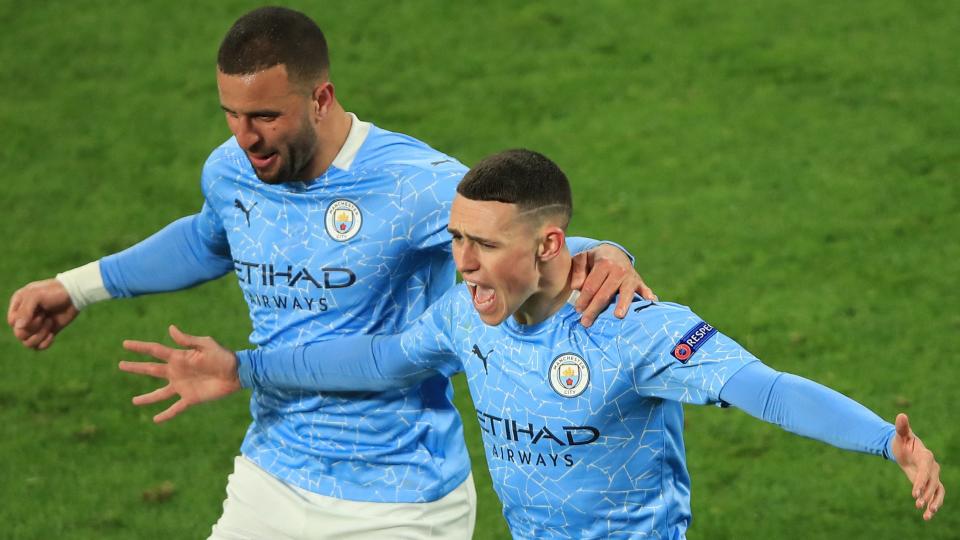 Manchester City's Phil Foden (right) celebrates after scoring a goal against Borussia Dortmund in the second leg of their UEFA Champions League quarterfinal.