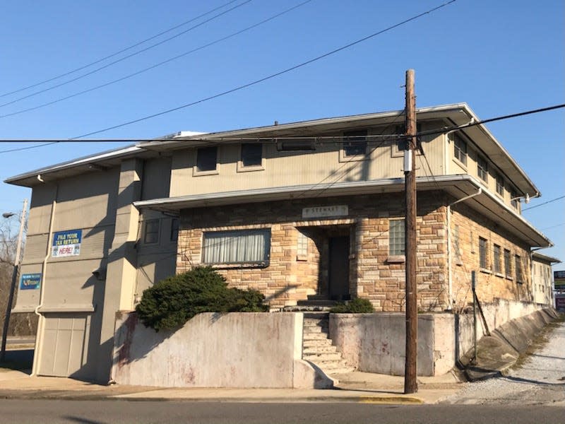 Dr. J.W. Stewart's building at the corner of Sixth Street and Meighan Boulevard