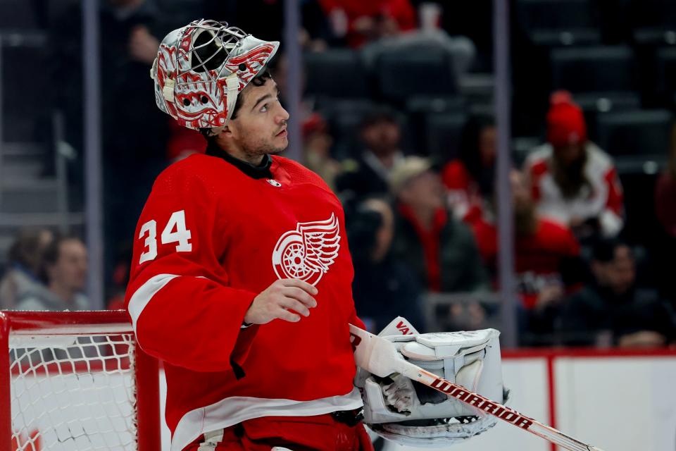 Detroit Red Wings goaltender Alex Lyon looks at the scoreboard in the first period against the Dallas Stars at Little Caesars Arena, Tuesday, Jan. 23, 2024.