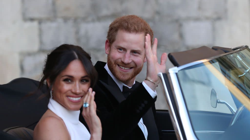 windsor, united kingdom may 19 duchess of sussex and prince harry, duke of sussex wave as they leave windsor castle after their wedding to attend an evening reception at frogmore house, hosted by the prince of wales on may 19, 2018 in windsor, england photo by steve parsons wpa poolgetty images