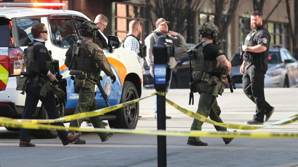Police deploy at the scene of a mass shooting near Slugger Field baseball stadium in downtown Louisville, Kentucky, April, 10, 2023.  / Credit: Michael Clevenger/USA Today Network via REUTERS