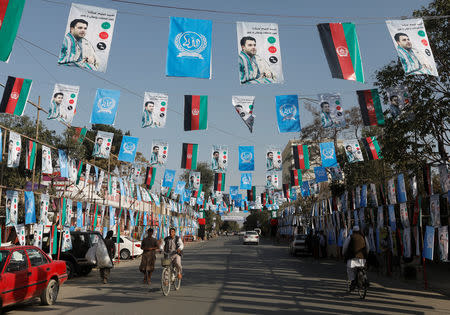 Election posters of parliamentarian candidates are installed during the elections campaign in Kabul, Afghanistan September 30, 2018. The parliamentarian elections will be held on October 20, 2018. REUTERS/Omar Sobhani