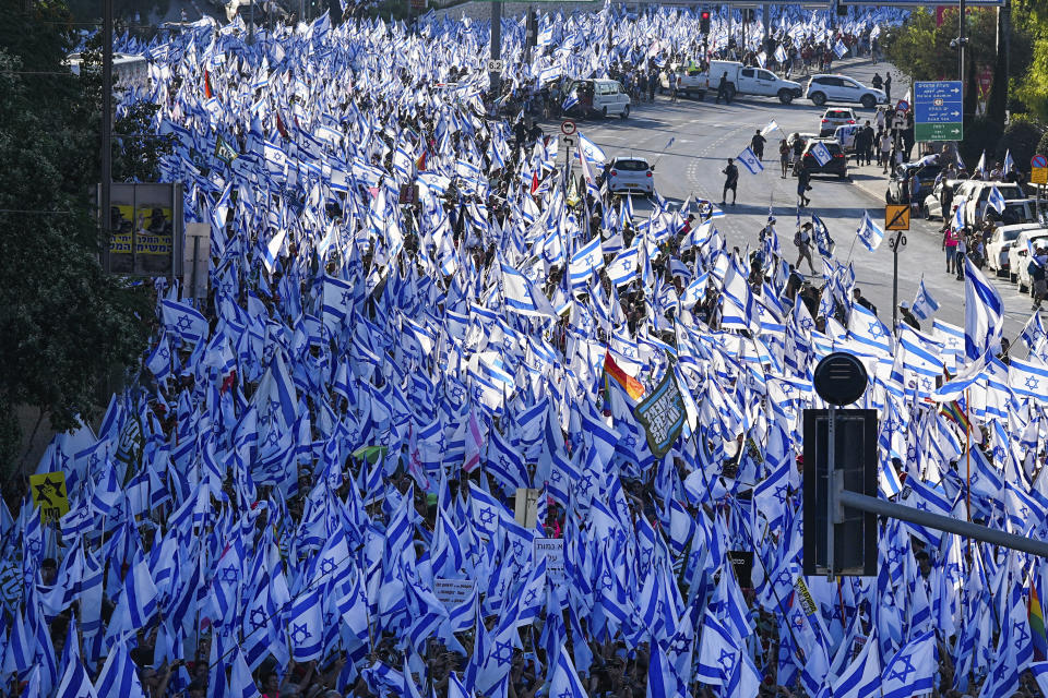 Thousands of Israelis march to Jerusalem in protest of plans by Prime Minister Benjamin Netanyahu's government to overhaul the judicial system, in Jerusalem, Saturday, July 22, 2023. Thousands of demonstrators entered the last leg of a four-day and nearly 70-kilometer (roughly 45-mile) trek from Tel Aviv to Jerusalem. Protest organizers planned to camp overnight outside Israel's parliament on Saturday. (AP Photo/Ohad Zwigenberg)