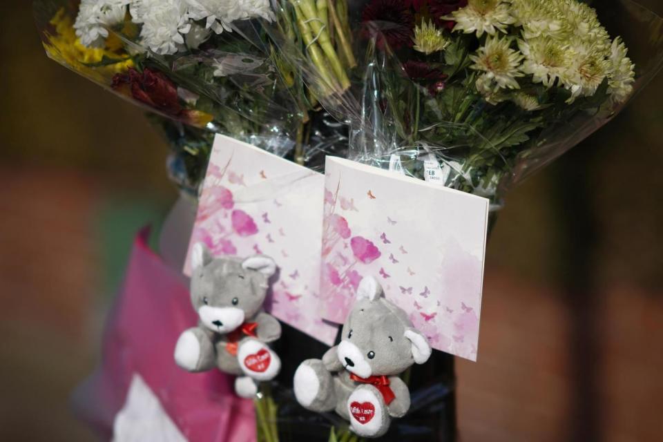 Floral tributes are left near the scene (Getty Images)