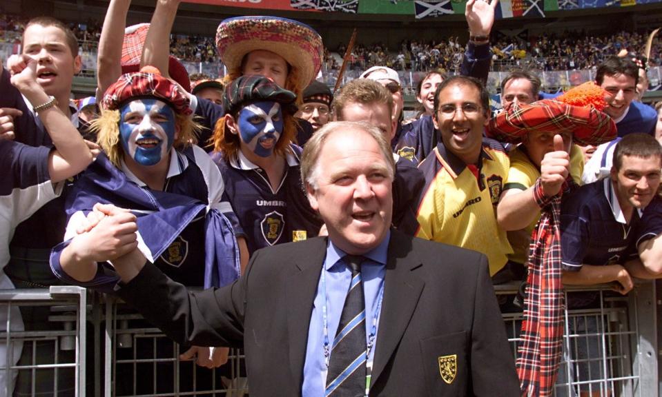 <span>Craig Brown greets the fans at the Stade de France before Scotland’s opening match against <a class="link " href="https://sports.yahoo.com/soccer/teams/brazil-women/" data-i13n="sec:content-canvas;subsec:anchor_text;elm:context_link" data-ylk="slk:Brazil;sec:content-canvas;subsec:anchor_text;elm:context_link;itc:0">Brazil</a> at the 1998 World Cup.</span><span>Photograph: Toshifumi Kitamura/AFP/Getty Images</span>