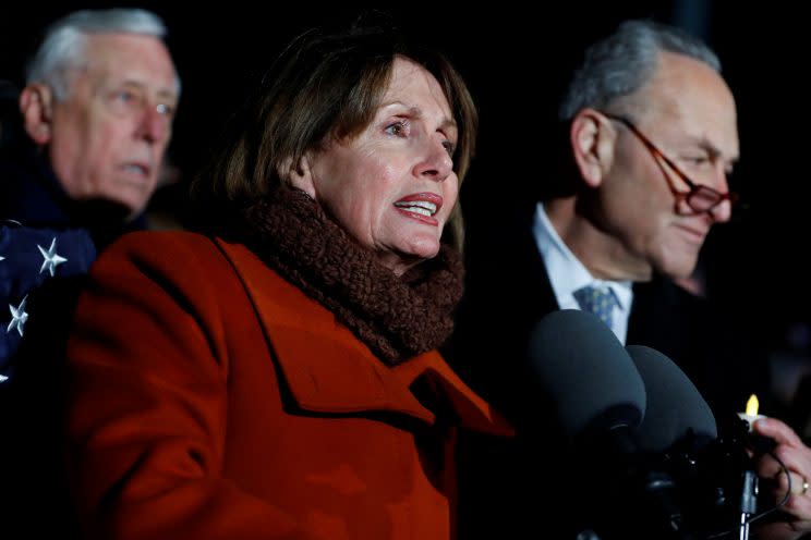 Pelosi speaks during a rally against President Trump's travel ban outside the Supreme Court in Washington, D.C., earlier this week. (Aaron P. Bernstein/Reuters)