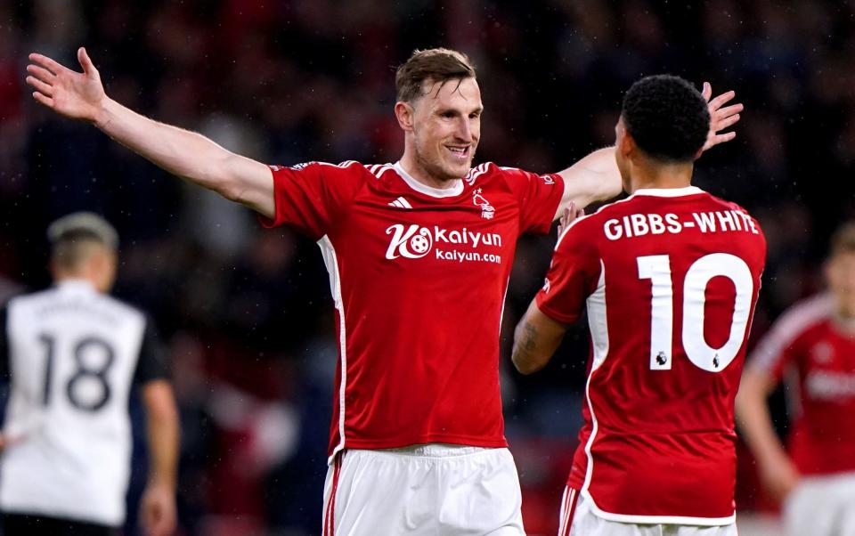 Nottingham Forest's Chris Wood celebrates with teammate Morgan Gibbs-White after scoring the second goal of the match during the Premier League match at the City Ground, Nottingham