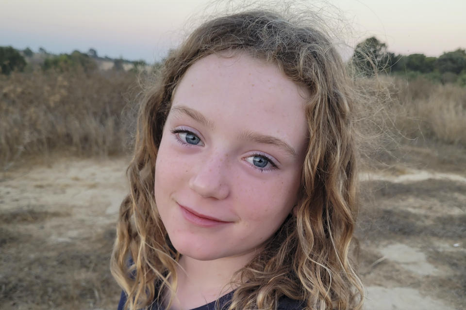 This September 2023 photo shows Emily Hand near Kibbutz Be’eri, Israel. Emily is believed to be among the hostages taken by Hamas militants in their incursion into Israel on Oct. 7, 2023. (Yael Shahrur Noah via AP).