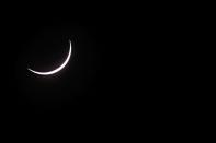 Near totality is seen during the solar eclipse at Palm Cove, Australia.