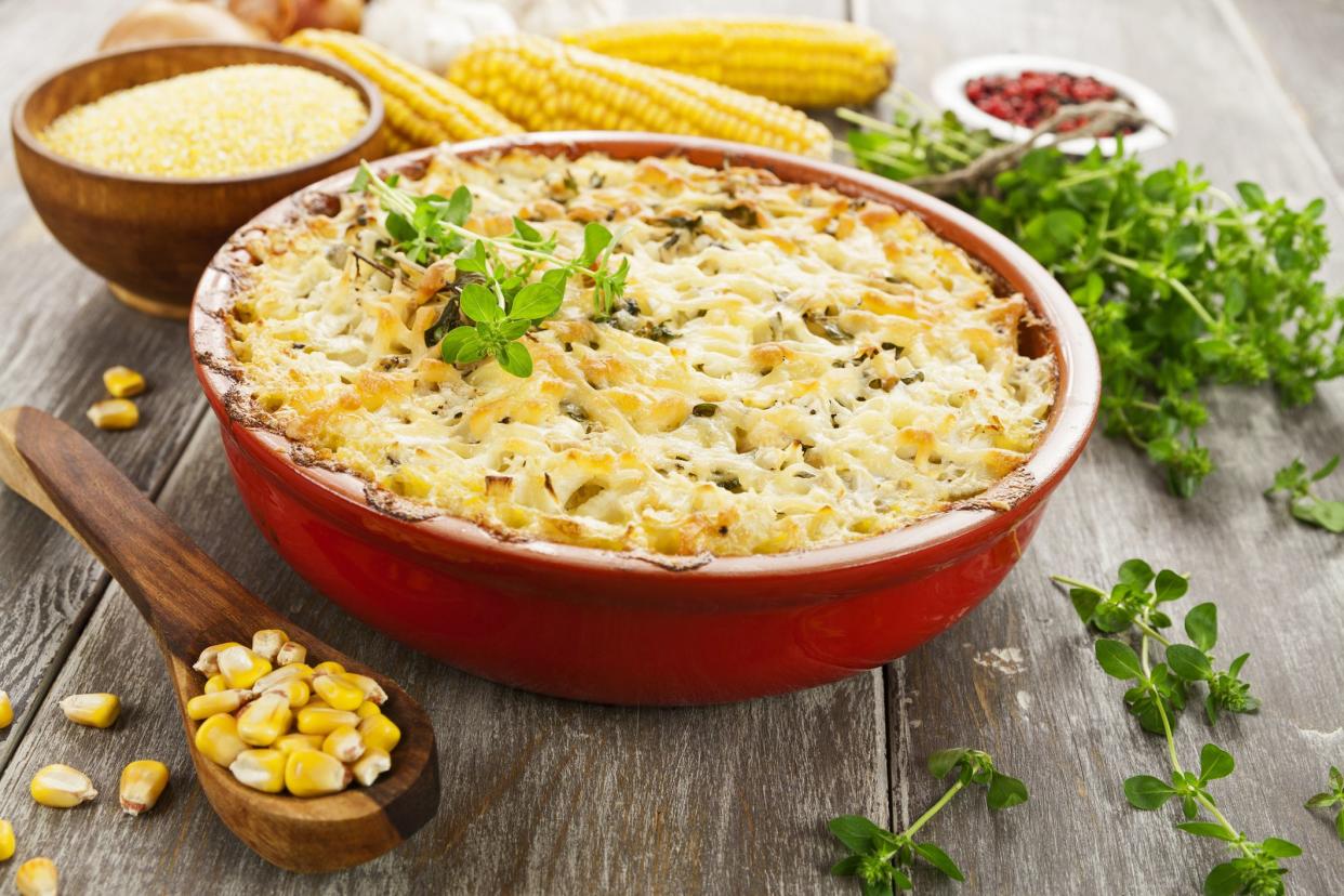 Fish baked with corn groats and cheese