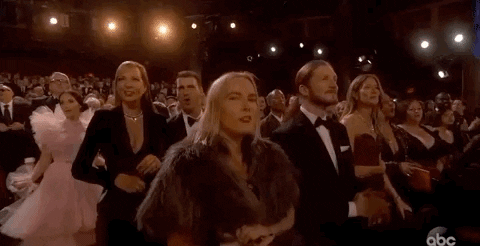 The Mom star lived her best life during Queen's performance of "We Will Rock You" and "We Are the Champions" at the 2019 Oscars.