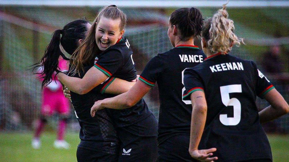 Celebration time for Glentoran after scoring in their big win over Lisburn Rangers