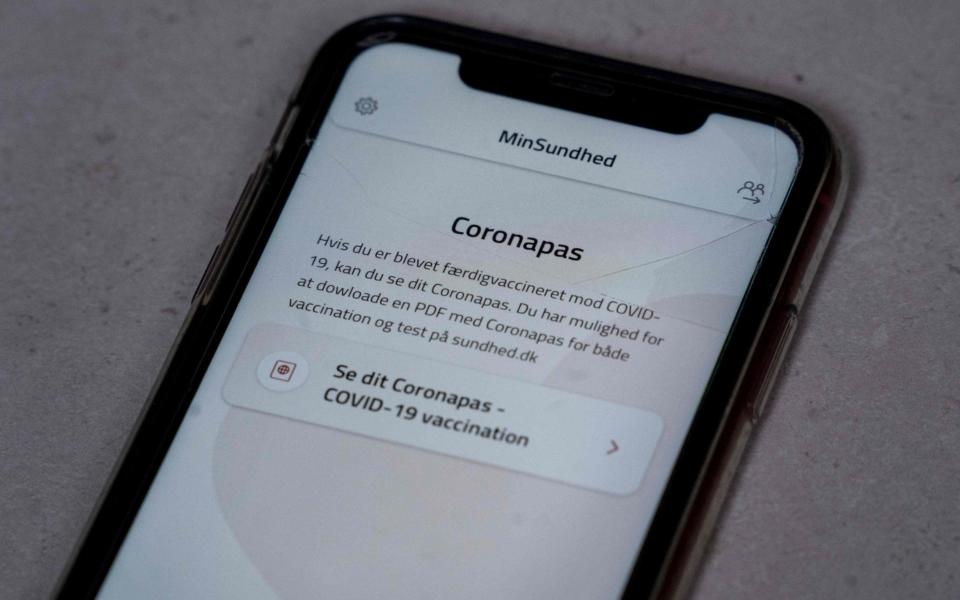 A smartphone with the MinSundhed app and a Corona passport link - Liselotte Sabroe / Ritzau Scanpix / AFP