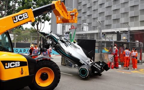 Valtteri Bottas's Mercedes is recovered - Credit: REUTERS/Thomas Peter