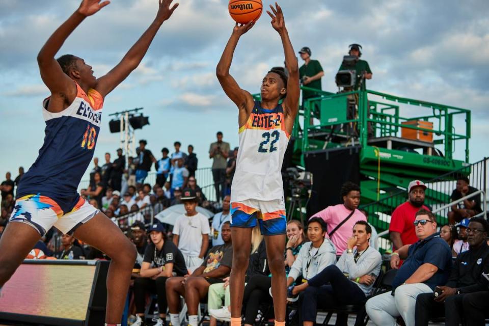 Class of 2024 Kentucky men’s basketball recruit Tre Johnson attempts a three-pointer during the Under Armour Next Elite 24 event in August 2023 in Chicago. Johnson now plays for the Houston Hoops travel basketball program.
