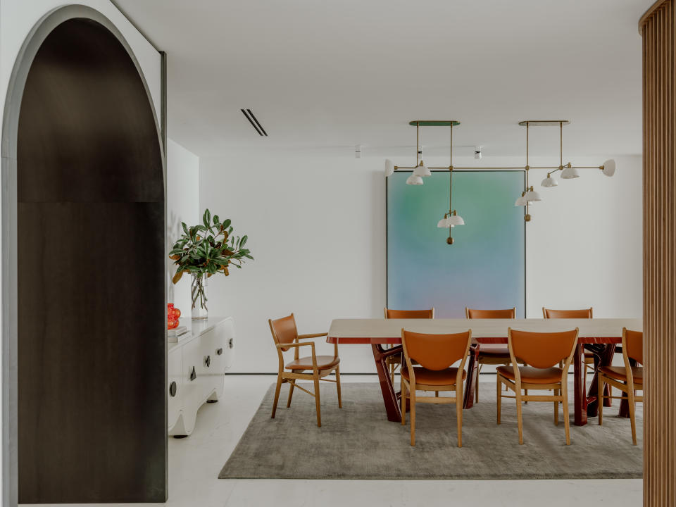 A dining room with wooden furniutre