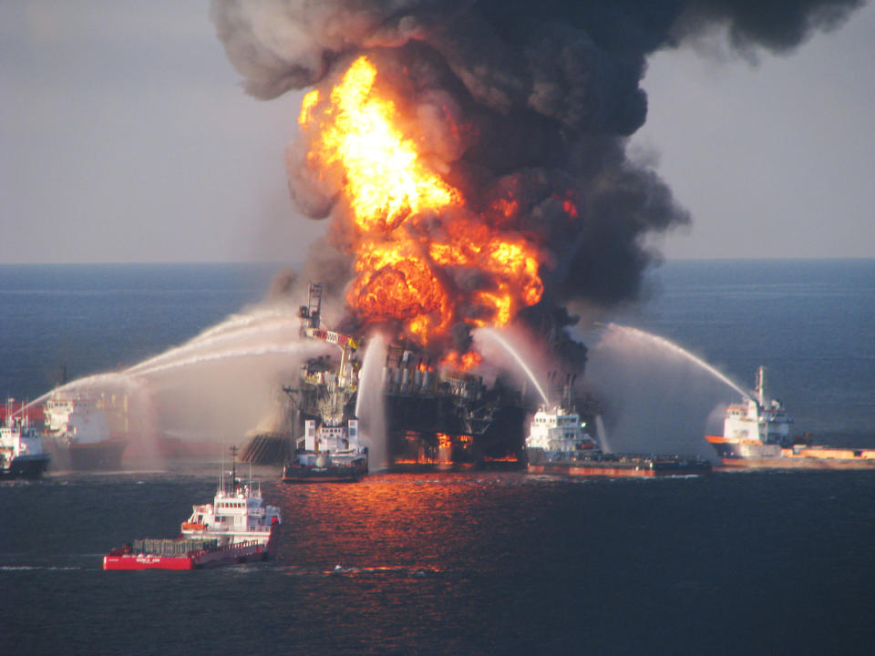 Fire boats battle a fire at the off shore oil rig Deepwater Horizon April 21, 2010 in the Gulf of Mexico off the coast of Louisiana. Multiple Coast Guard helicopters, planes and cutters responded to rescue the Deepwater Horizons 126 person crew after an explosion and fire caused the crew to evacuate. (Photo by U.S. Coast Guard via Getty Images)