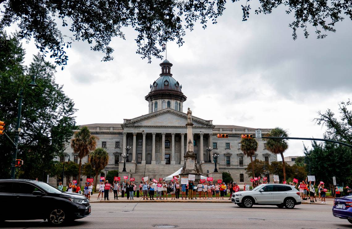 People rally outside the South Carolina Statehouse as members of the South Carolina House of Representatives prepare to vote on legislation related to an abortion ban in the state on Tuesday, Aug. 30, 2022.