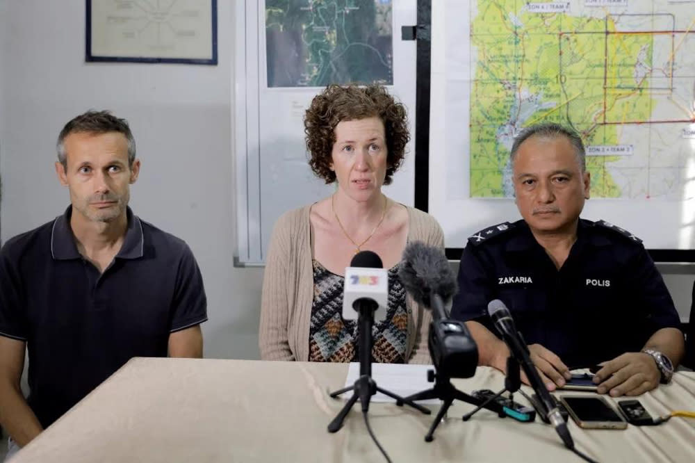 Matthew Searle from the Lucie Blackman Trust said that he is the sole spokesman appointed by Nora’s parents, mum Maebh (centre) and father Sebastien Quoirin (left), to speak on their behalf. — Bernama pic