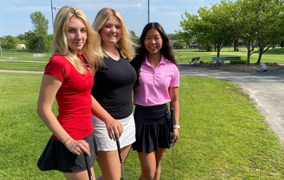 From left to right, Boylan's Eva Greenberg, Ella Greenberg and Demi Hampilos pose before hitting practice balls at Aldeen Practice Centre on May 16, 2023.