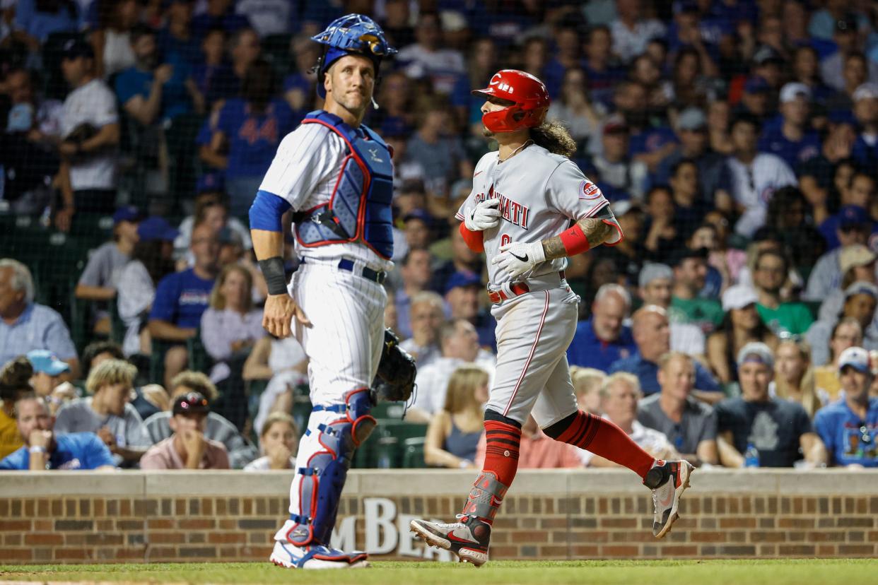 Cincinnati Reds second baseman Jonathan India (6) crosses home plate after hitting a three-run home run against the Chicago Cubs during the seventh inning at Wrigley Field on June 28.