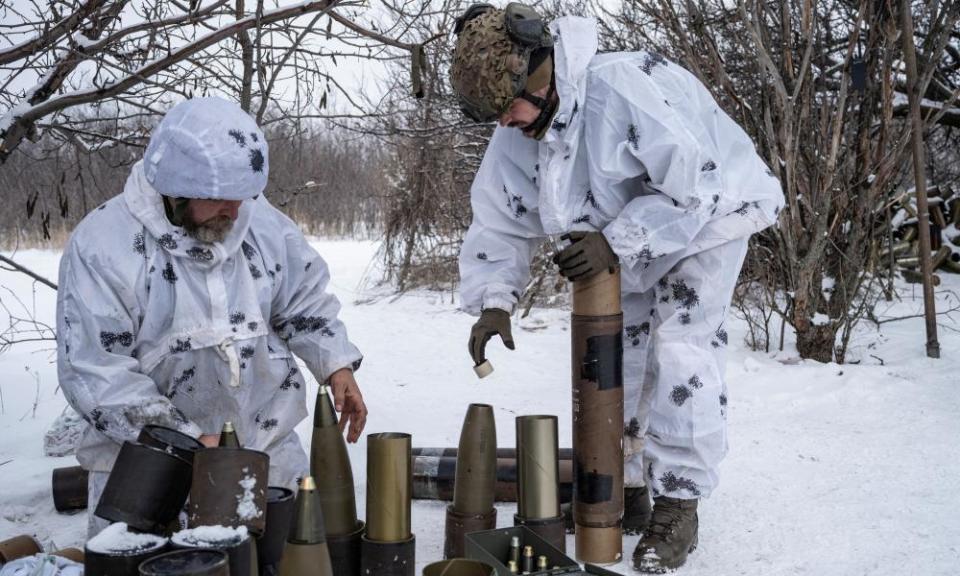 Ukrainian servicemen near Bakhmut, Donetsk, where the reported death toll ratio is five Russians to one Ukrainian.