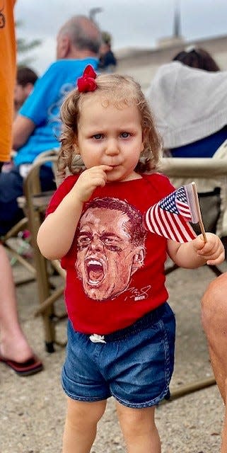 Richie Williams' daughter Quinn is seen at the 2022 Canton Repository Grand Parade.