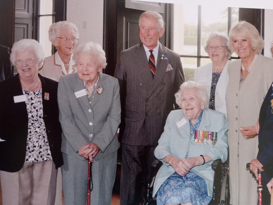 Gladys Eva, far left, meeting the Prince of Wales and the Duchess of Cornwall 