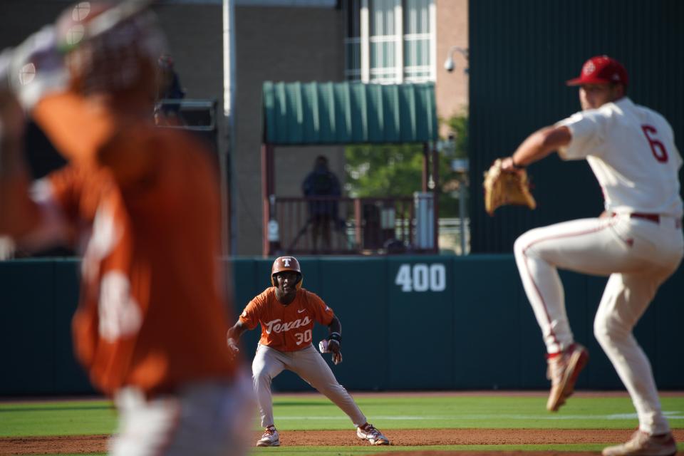 Texas Longhorns infielder Dee Kennedy (30) leads from second base against the Louisiana Ragin Cajuns during the first round in the NCAA baseball College Station Regional May 31, 2024, at Olsen Field in College Station.