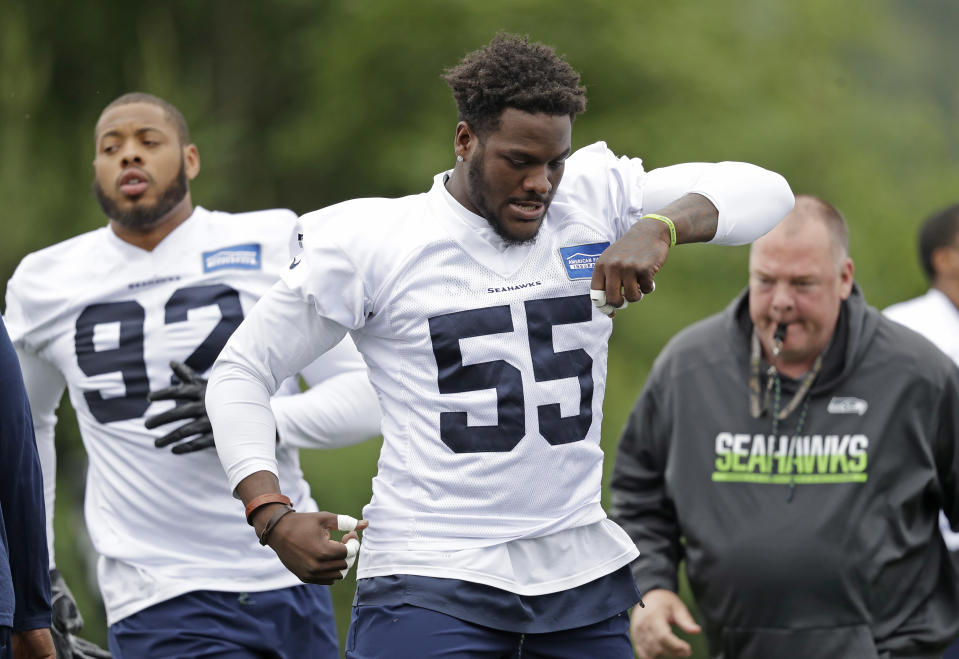 The Seahawks are looking for Frank Clark (55) to continue his rise as a defensive anchor in Seattle. (AP) 