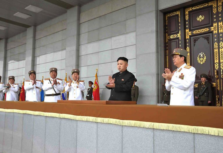 North Korean leader Kim Jong-Un (C) is shown surrounded by military leaders at the plaza of the Kumsusan Palace in Pyongyang, April 25, 2013