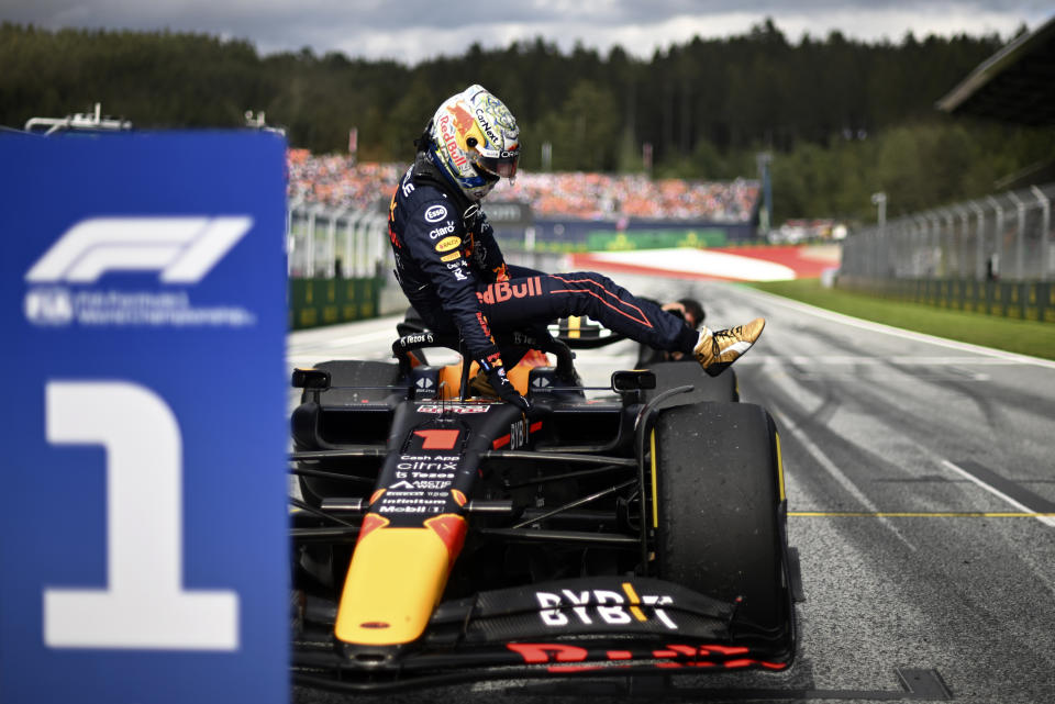 Red Bull driver Max Verstappen of the Netherlands leaves the car after winning the Sprint Race qualifying session at the Red Bull Ring racetrack in Spielberg, Austria, Saturday, July 9, 2022. The Austrian F1 Grand Prix will be held on Sunday July 10, 2022. (Christian Bruna/Pool via AP)