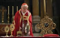 Archbishop of Westminster Cardinal Vincent Nicolls places the Hungarian relic of St Thomas a Beckett on an altar during a ceremony at Westminster Cathedral in London, Britain May 23, 2016. REUTERS/Neil Hall