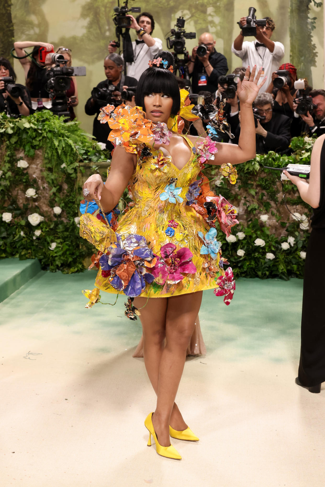 Nicki Minaj Puts On a Quirky Display in Canary Yellow Floral Appliqué Dress at the 2024 Met Gala