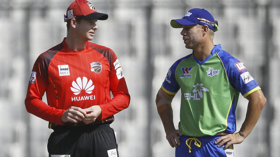 Steve Smith and David Warner. (Photo by STR/AFP/Getty Images)