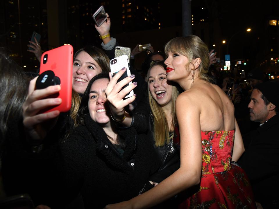 Taylor Swift with fans in 2019.