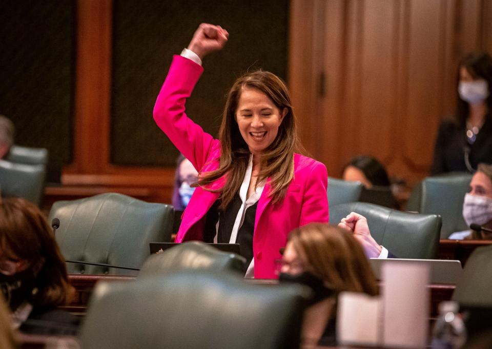 Illinois State Rep. Jennifer Gong-Gershowitz, D-Glenview, celebrates the passage of House Bill 367 on the floor of the Illinois House of Representatives in Springfield, Ill., on May 31, 2021.