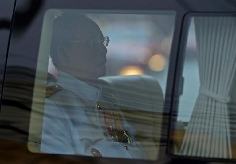 Thai King Bhumibol Adulyadej leaves Siriraj hospital for Coronation Day celebrations, in Bangkok, on May 5, 2015