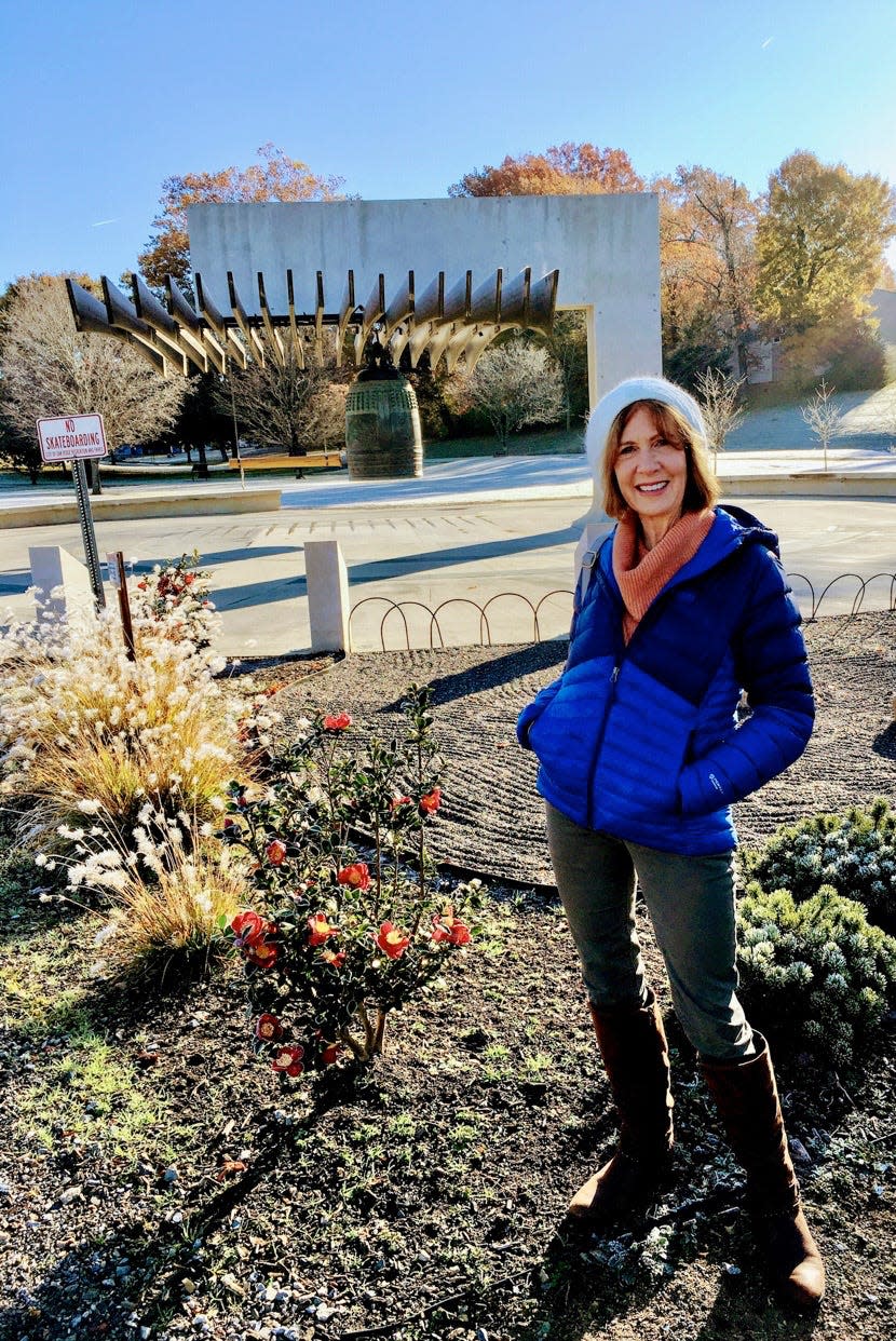 Clara Culnon visits the Oak Ridge International Friendship Bell.