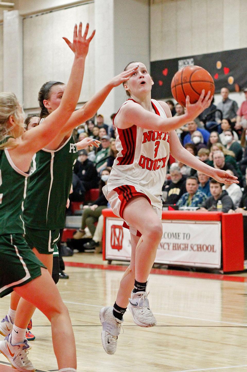 Raiders captain Orlagh Gormley takes a layup for two. The North Quincy High girls basketball team beat Pentucket in MIAA tournament action on Wednesday March 9, 2022.