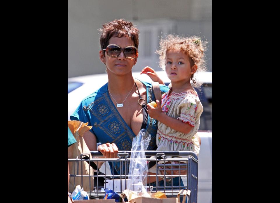 Halle Berry wears a blue dress over her bikini as she takes her daughter Nahla shopping for groceries at Bristol Farms.