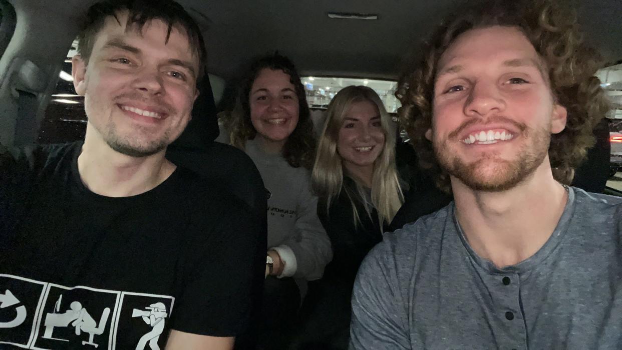 Shobi, Greg, Bridget, and Abby in a rental car.