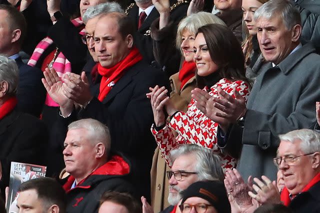 <p>GEOFF CADDICK/AFP via Getty</p> Prince William and Kate Middleton at a rugby match in Cardiff, Wales in February.