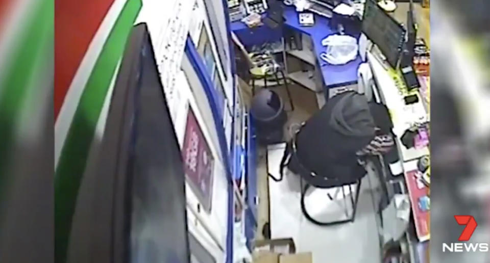 The attendant appeared to be tired in the surveillance footage. Source: 7 News