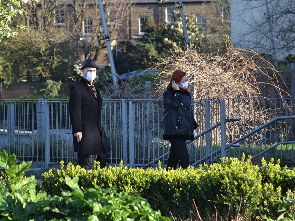 LONDON, UNITED KINGDOM - MARCH 22: People walk around and enjoy the sunny day at Greenwich although the country's death toll from coronavirus hit 281 and cases reached 5,683 in London, United Kingdom on March 22, 2020. (Photo by Hasan Esen/Anadolu Agency via Getty Images)