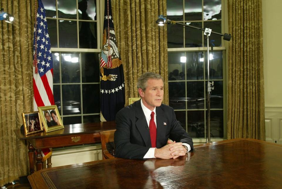 Photograph of George W. Bush in the Oval Office