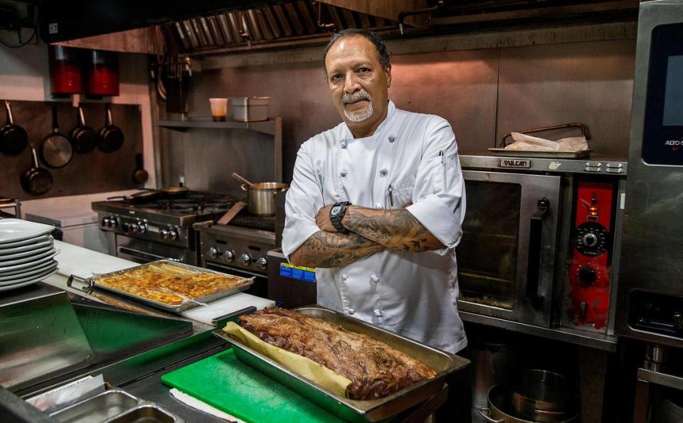 When the Fontainebleau Hotel laid off cook Noraldo Saavedra in March 2020, he found work elsewhere. He doesn’t plan to return in favor of finding higher wages elsewhere. He poses in the kitchen of MKT Kitchen restaurant in Coral Gables on Friday, June 11, 2021.