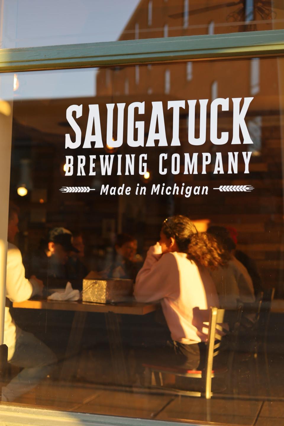 Saugatuck Brewing Company held a ribbon cutting for its new location in downtown Kalamazoo Monday, April 10.